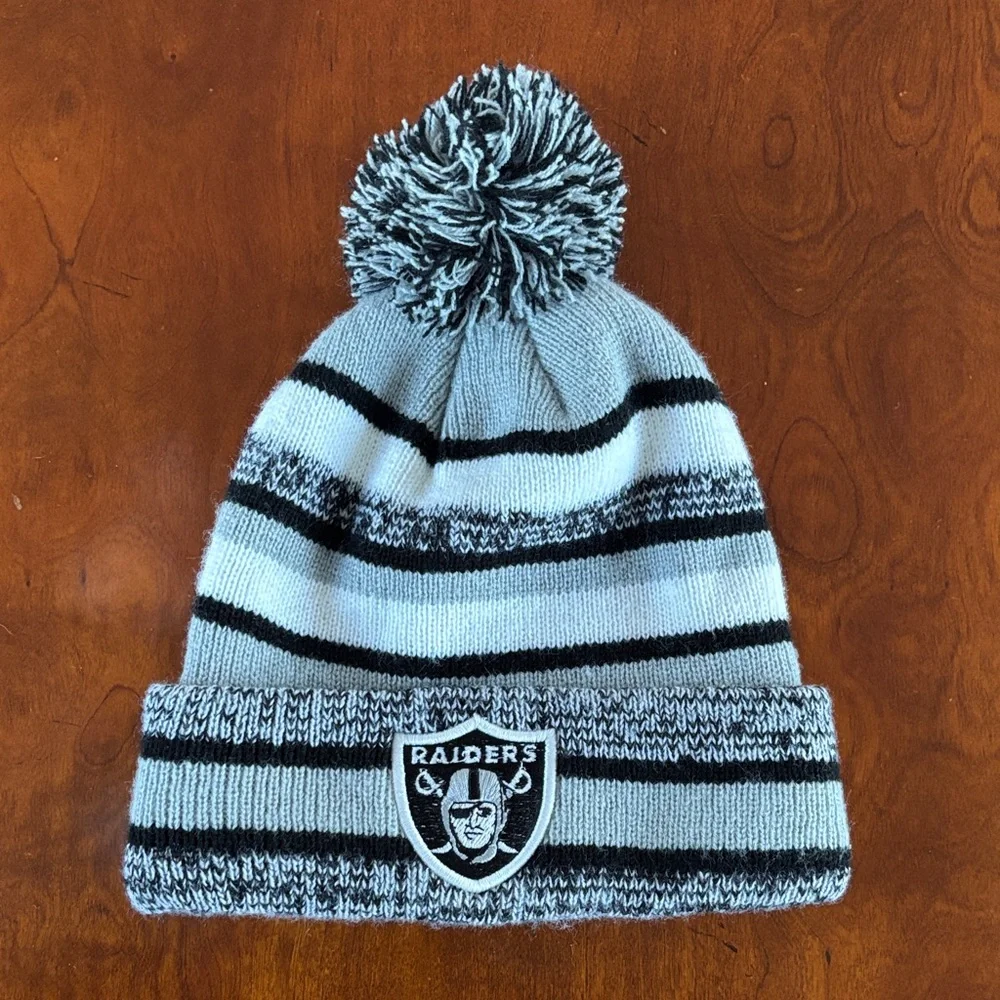“Raiders” Gray and Black Pom-Pom Beanie.  EUC‎